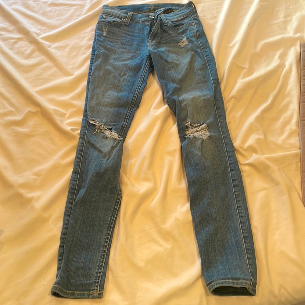 7 for all mankind size 24 jeans. Classic blue jeans, distressed. Skinny straight